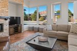 Large windows offer natural light and great Sedona views